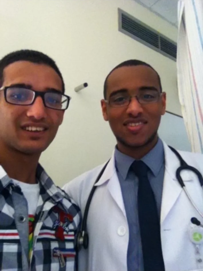 Photograph of Mahmoud with Dr. Elsheikh Abdelrahim, who was a resident doctor when his eosinophilic gastrointestinal disease was first identified